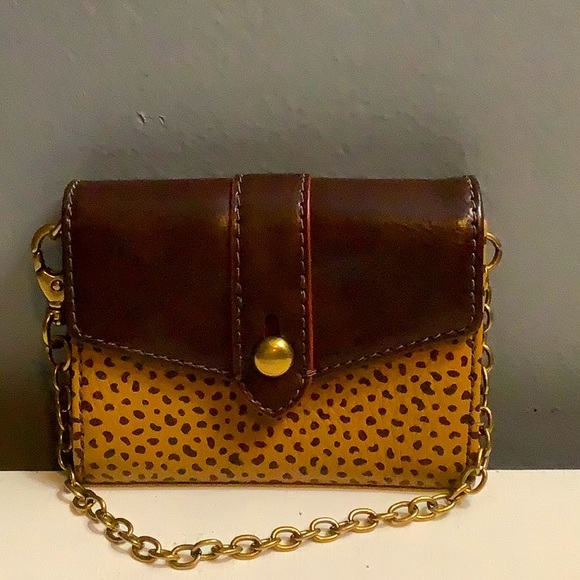 Fossil leopard small clutch. - Picture 1 of 4